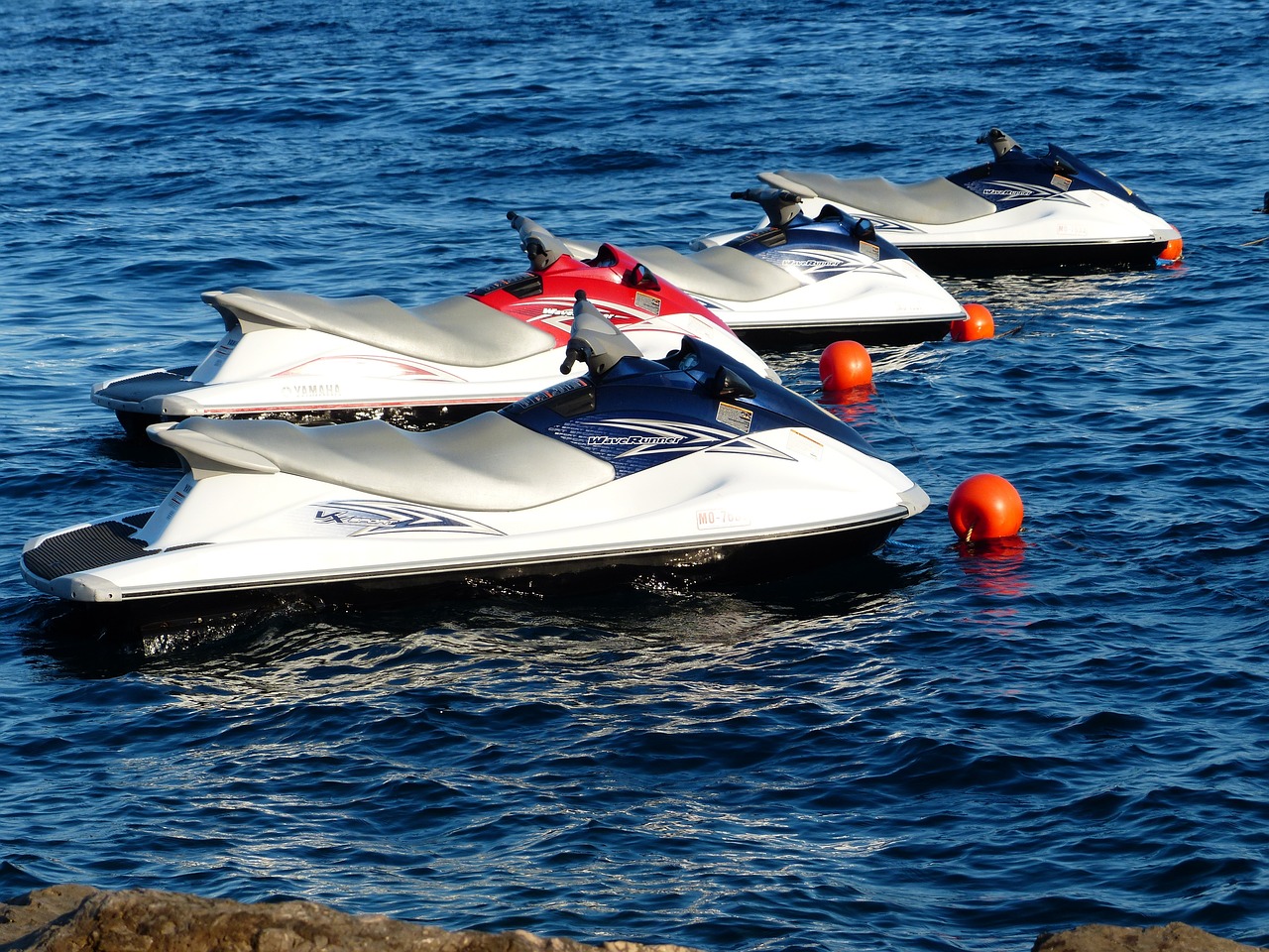 A white speedboat on the water